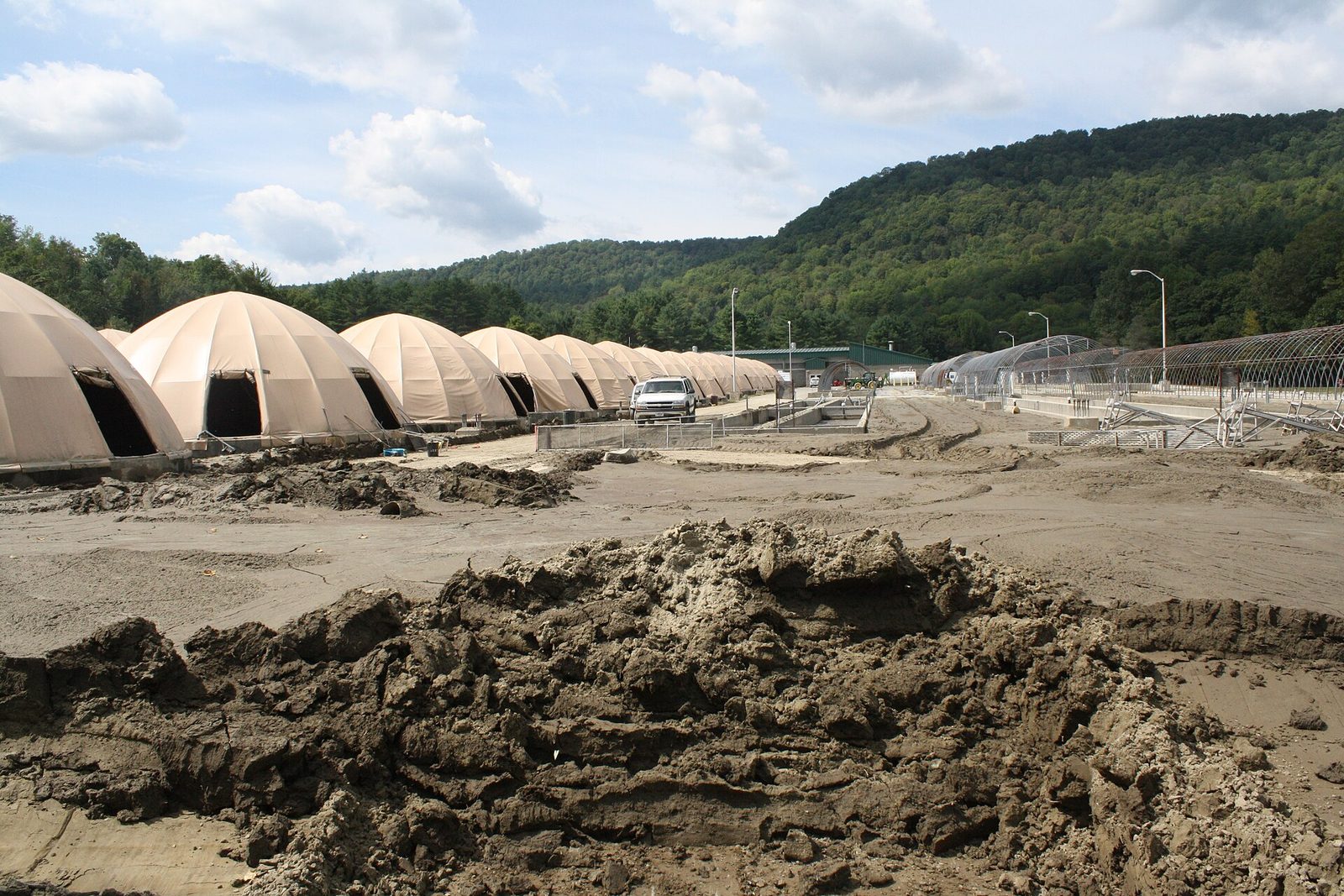 River sediment deposited across hatchery grounds by Hurricane Irene flood waters.